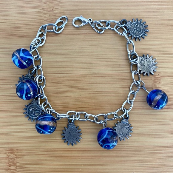 Boutique Jewelry - Bohemian Sun Face Celestial Charm Bracelet Blue Swirl Glass Bead Silver Tone
